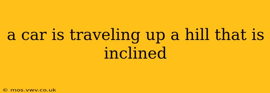 a car is traveling up a hill that is inclined